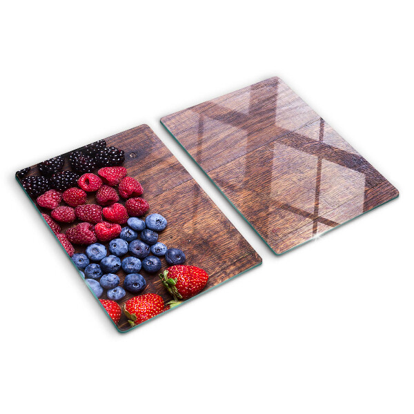 Schneidebrett glas Waldfrüchte auf Holzgrund