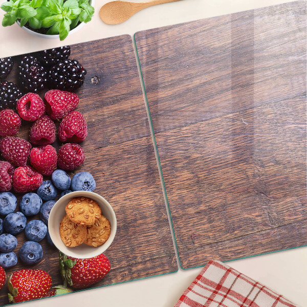 Schneidebrett glas Waldfrüchte auf Holzgrund