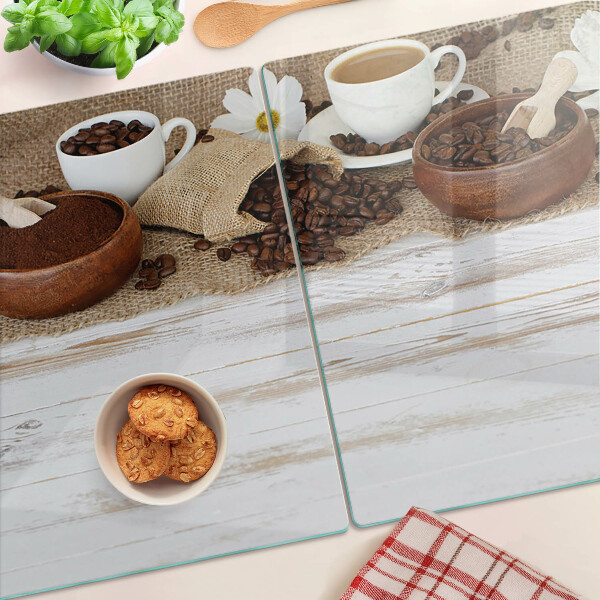 Schneidebrett Kaffee und Kaffeebohnen