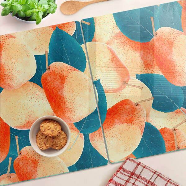 Schneidebrett Glas mit einem Motiv von Pfirsichen vor einem Blätterhintergrund