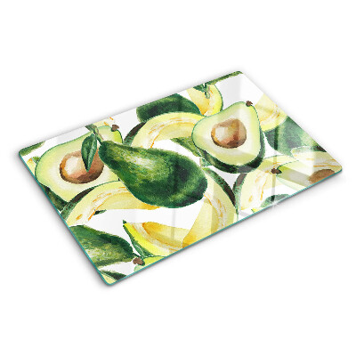Glas schneidebrett Avocado mit Blättern im Hintergrund