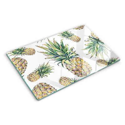 Schneidebrett Glas mit Motiv einer Ananas vor weißem Hintergrund