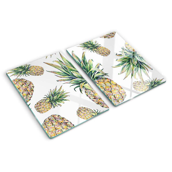 Schneidebrett Glas mit Motiv einer Ananas vor weißem Hintergrund