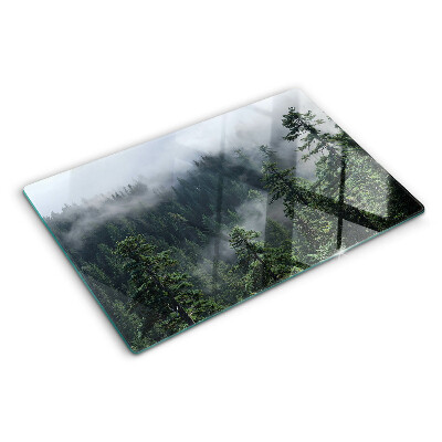 Glas-Schneidebrett mit dem Motiv „Wald in den Wolken”