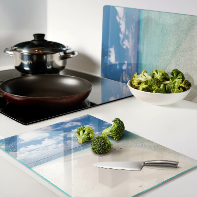 Glas schneidebrett Strand mit blauem Himmel