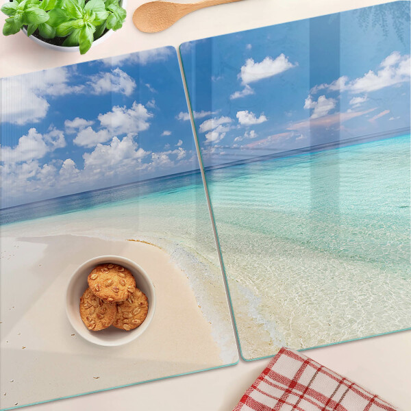 Glas schneidebrett Strand mit blauem Himmel