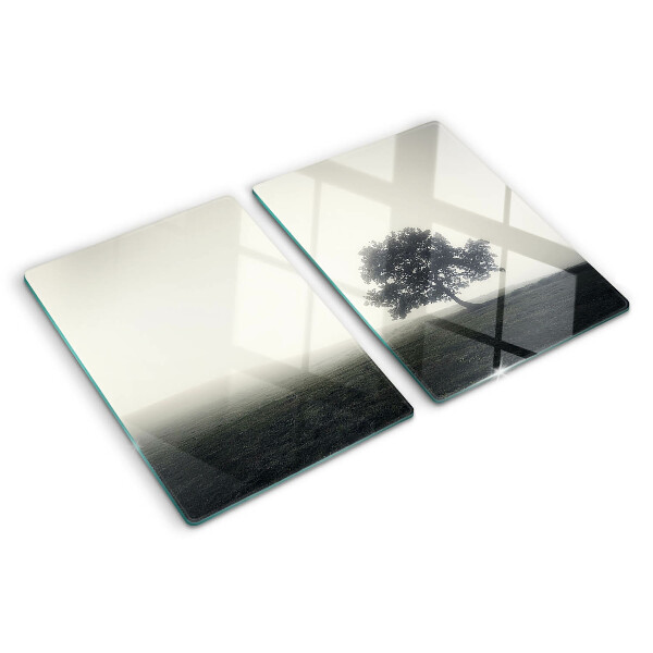 Schneidebrett Glas mit Motiv eines Baums in nebliger Landschaft