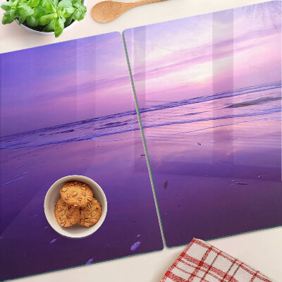 Glas schneidebrett Sonnenuntergang über dem Meer