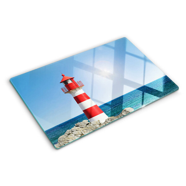 Glas schneidebrett Ein Leuchtturm über dem Meer
