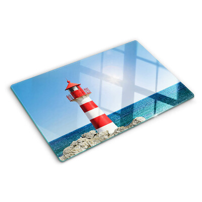Glas schneidebrett Ein Leuchtturm über dem Meer