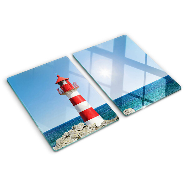 Glas-Schneidebrett mit Motiv eines Leuchtturms über dem Meer