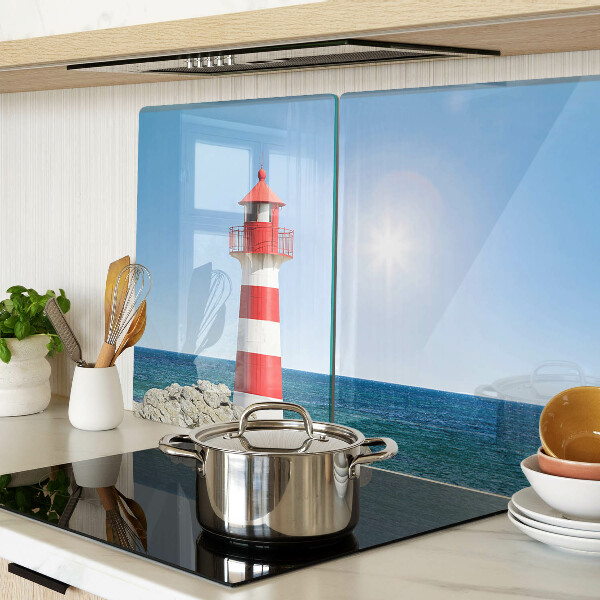 Glas-Schneidebrett mit Motiv eines Leuchtturms über dem Meer