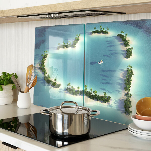 Glas-Schneidebrett mit einem Motiv einer paradiesischen Insel und Palmen