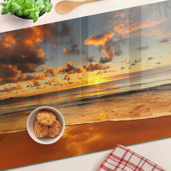 Glas schneidebrett Sonnenuntergang über dem Meer