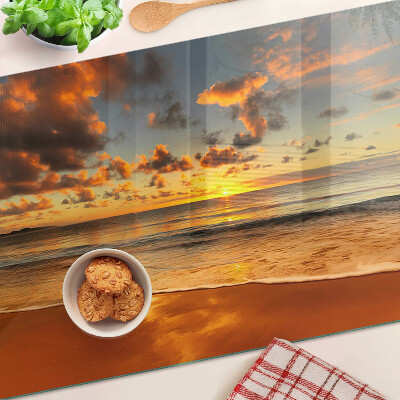 Glas-Schneidebrett mit Motiv ‚Sonnenuntergang über dem Meer‘