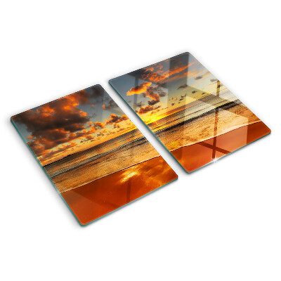 Glas schneidebrett Sonnenuntergang über dem Meer