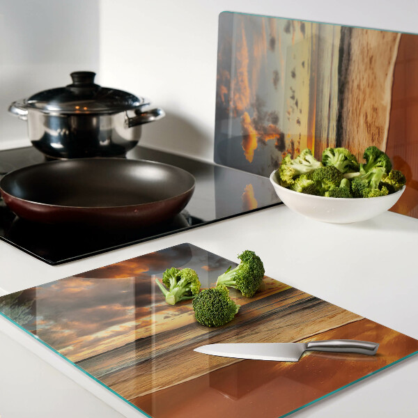 Glas schneidebrett Sonnenuntergang über dem Meer