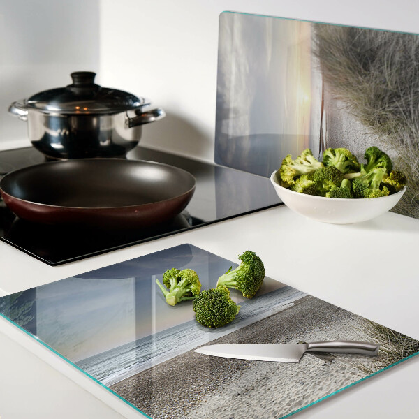 Schneidebrett mit Motiv eines Strandes bei Sonnenuntergang