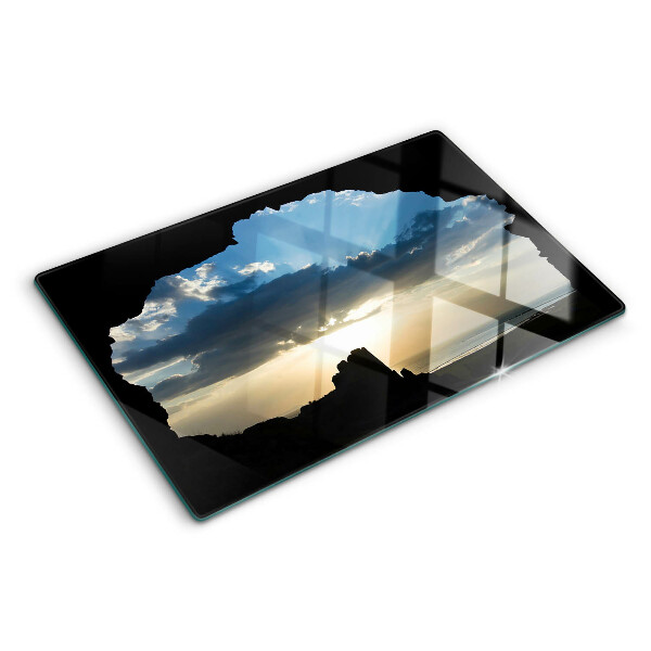 Glas schneidebrett Sonnenuntergang hinter den Wolken