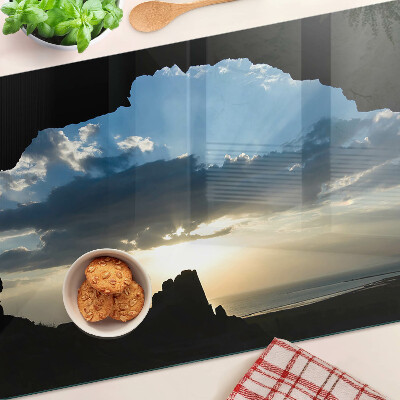 Glas schneidebrett Sonnenuntergang hinter den Wolken