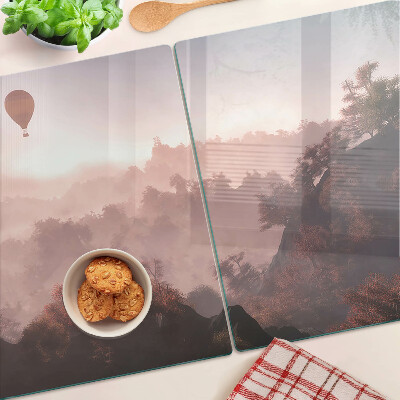 Schneidebrett Glas mit Motiv eines Heißluftballons über einer Landschaft