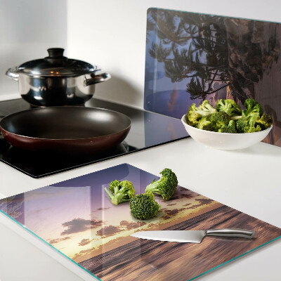 Schneidebrett Sonnenuntergang über dem Strand