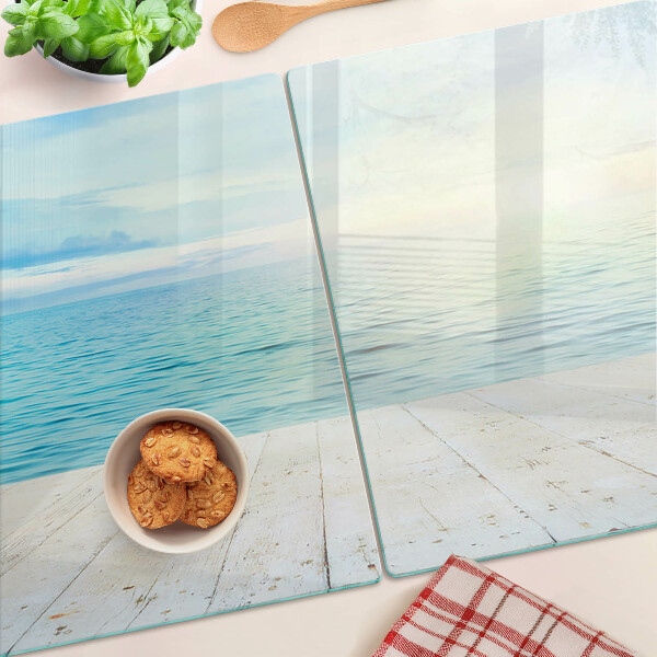 Glas-Schneidebrett mit Motiv 'Das Meer und der hölzerne Steg'