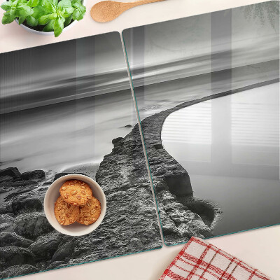 Schneidebrett Glas mit einer Küstenlandschaft in Grautönen