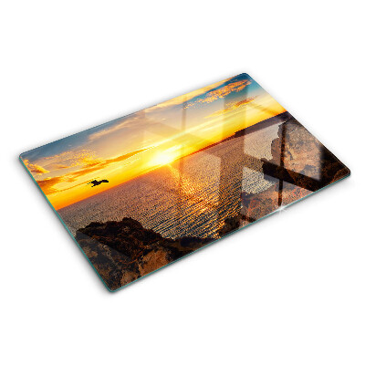 Glas schneidebrett Sonnenuntergang über dem Meer