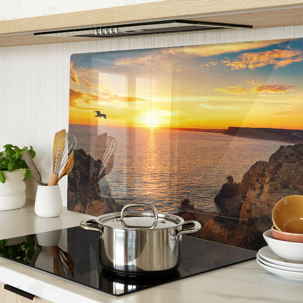 Glas schneidebrett Sonnenuntergang über dem Meer