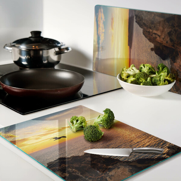 Glas-Schneidebrett mit Motiv 'Sonnenuntergang über dem Meer'