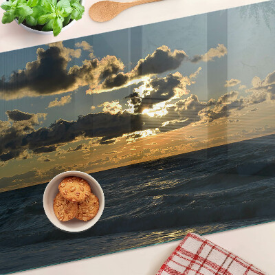 Glas schneidebrett Sonnenuntergang über dem Meer