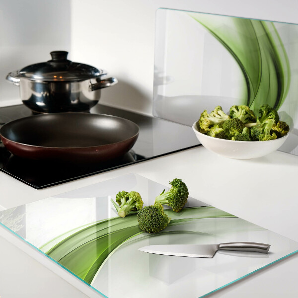 Schneidebrett Glas mit grünem abstraktem Wellenmuster