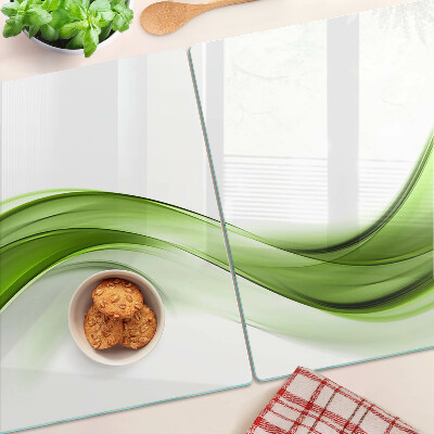 Schneidebrett Glas mit grünem abstraktem Wellenmuster