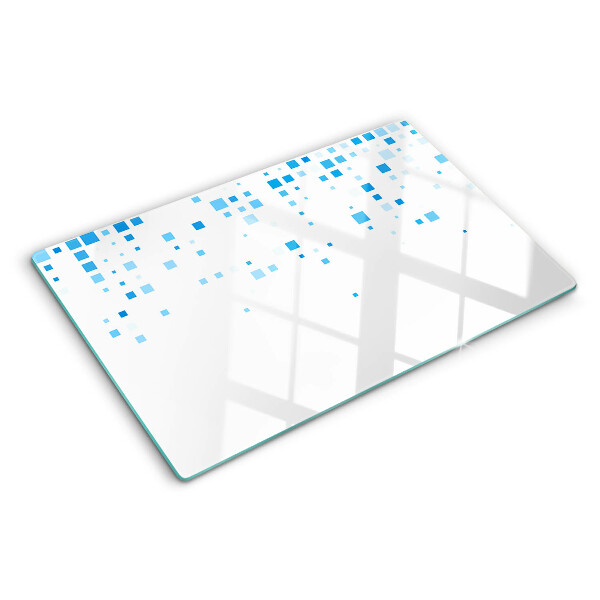Glas-Schneidebrett mit blauem Quadratmuster auf weißem Hintergrund