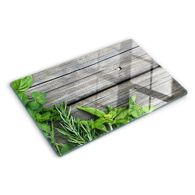 Glas schneidebrett Grüne Kräuter auf Holzgrund