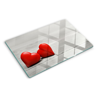 Schneidebrett mit rotem Herzmotiv auf Holzoptik