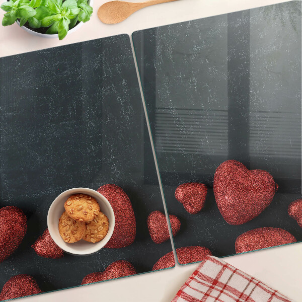 Schneidebrett glas Rote Herzen auf dunklem Hintergrund