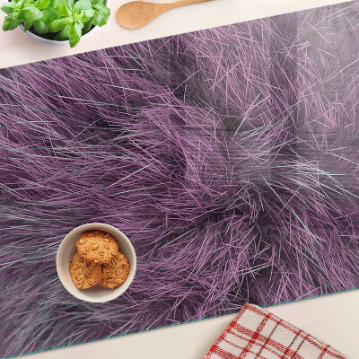Glas-Schneidebrett mit lila Fellüberzug