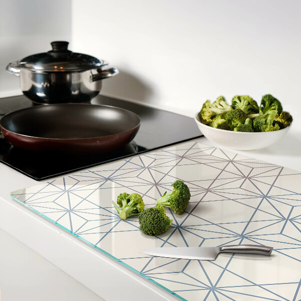 Glas-Schneidebrett mit geometrischem Muster aus Dreiecken und Linien
