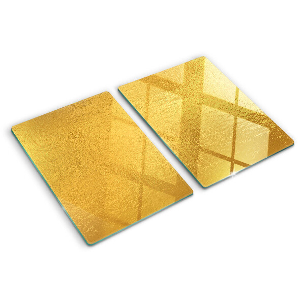 Glas-Schneidebrett mit goldfarbener, spiegelnder Oberfläche