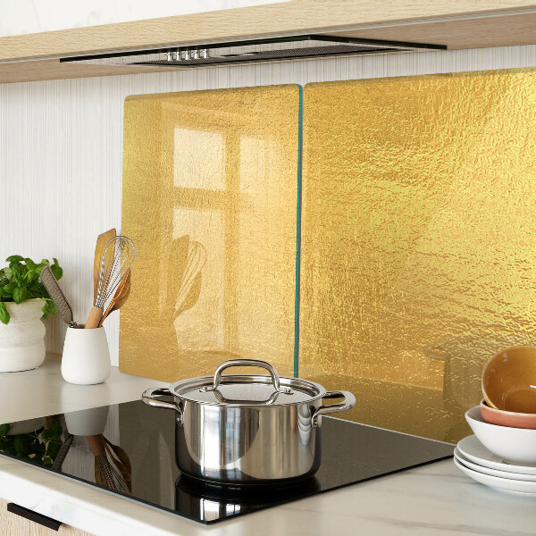 Glas schneidebrett Goldene Oberfläche mit Spiegelungen