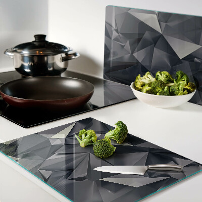 Glas-Schneidebrett mit geometrischem Muster in Grautönen