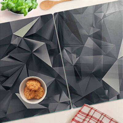 Glas-Schneidebrett mit geometrischem Muster in Grautönen