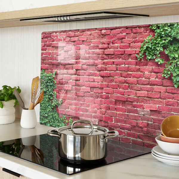 Schneidebrett Glas mit Motiv einer Ziegelmauer und Vegetation