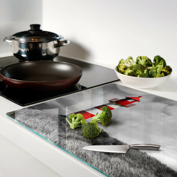 Schneidebrett Ein Leuchtturm in der Landschaft