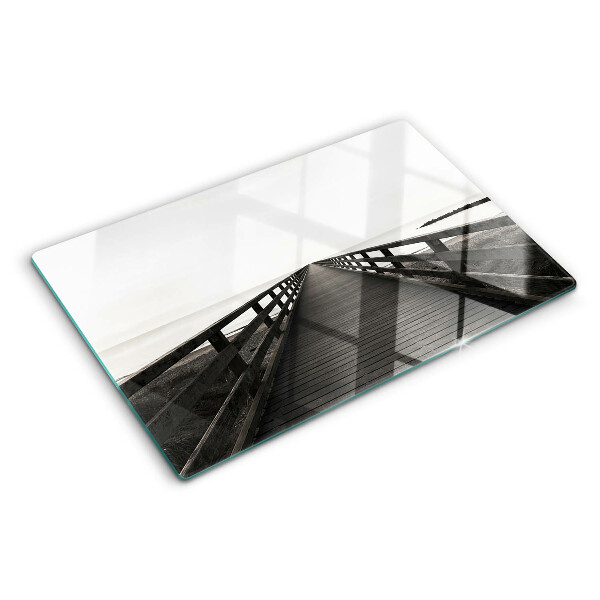 Schneidebrett mit Holzgriff in Form einer Brücke über dem Wasser