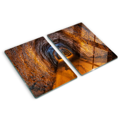 Schneidebrett Glas mit Motiv eines beleuchteten Tunnels in einer Höhle