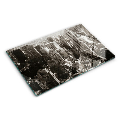Glas-Schneidebrett mit Panorama der Stadt in Schwarz-Weiß-Tönen