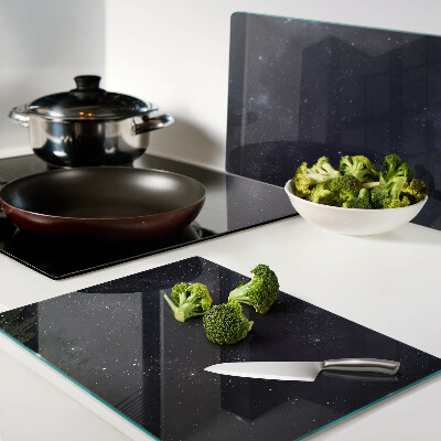 Schneidebrett Glas mit kosmischem Universum-Design und Sternmotiv